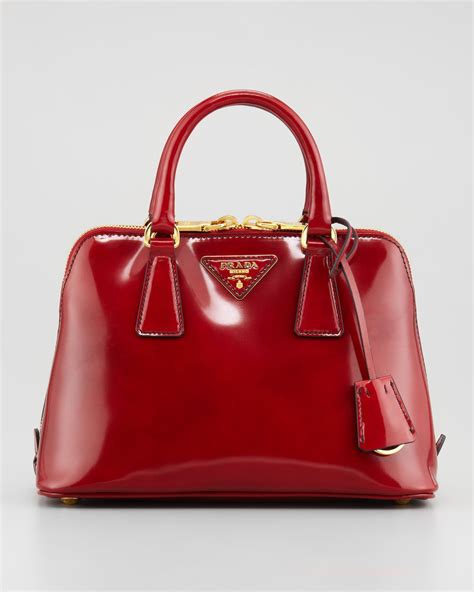 older red prada handbags.